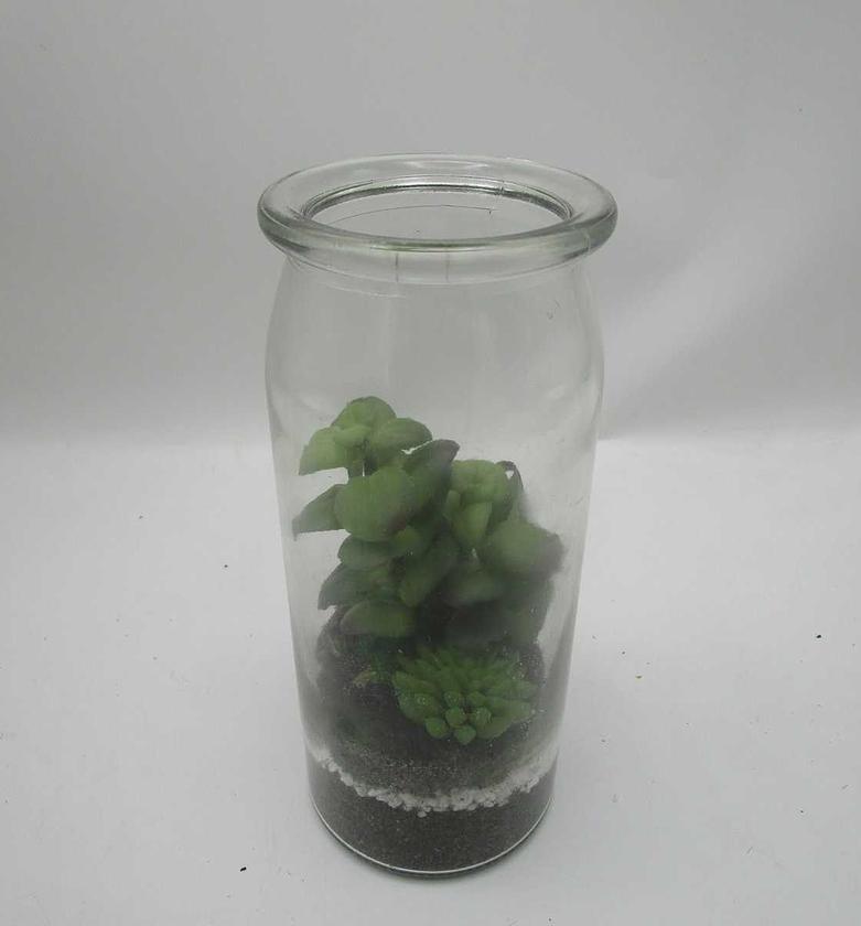 Artificial plants in glas image