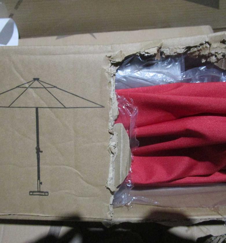 Umbrella with stand red a image