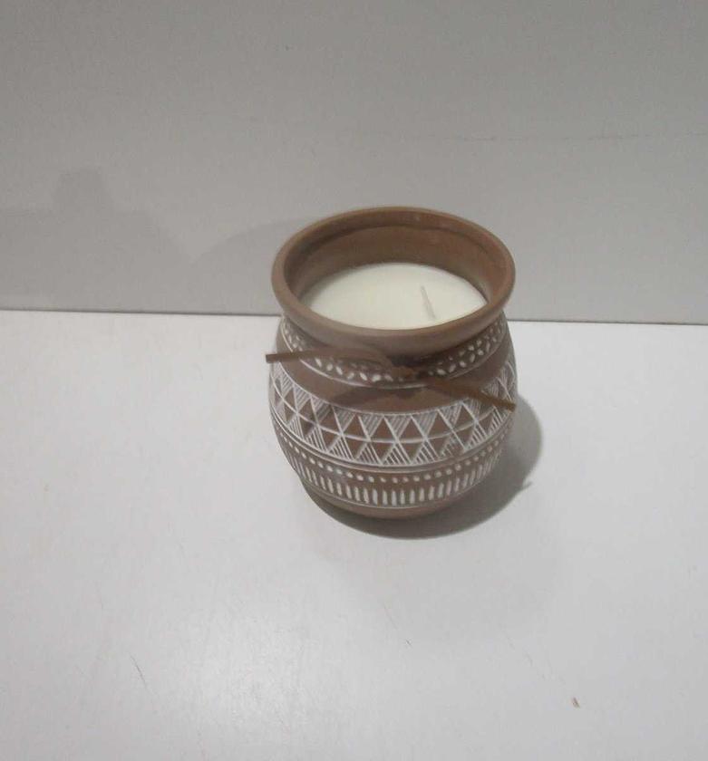 Scented candle in cement pot image