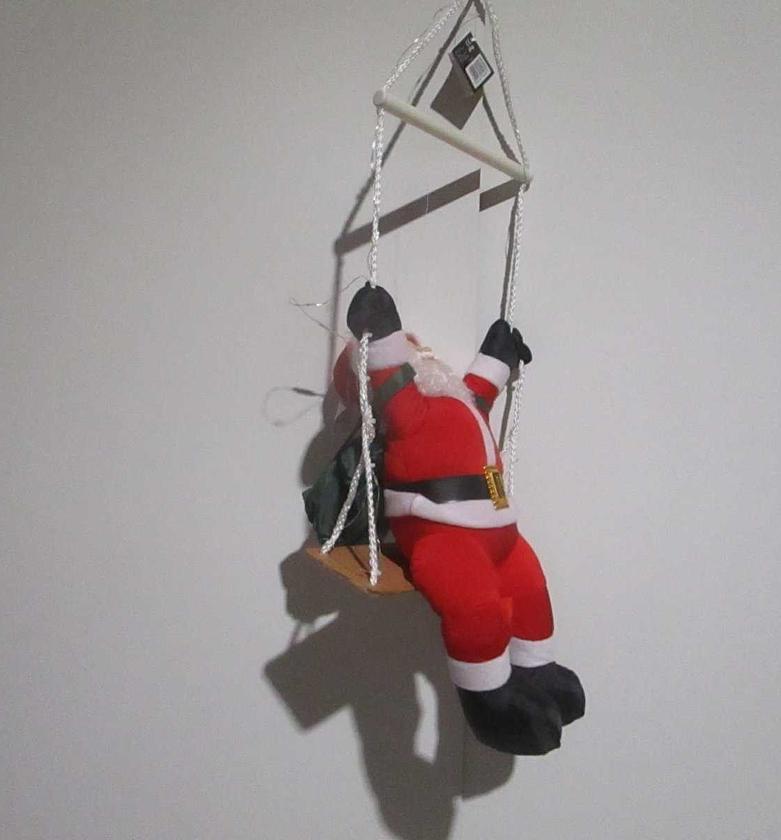 Christmas climbing santa swin image