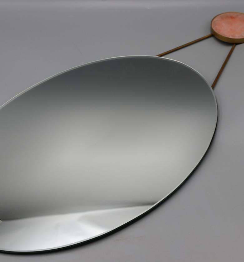 Oval mirror with marble d image