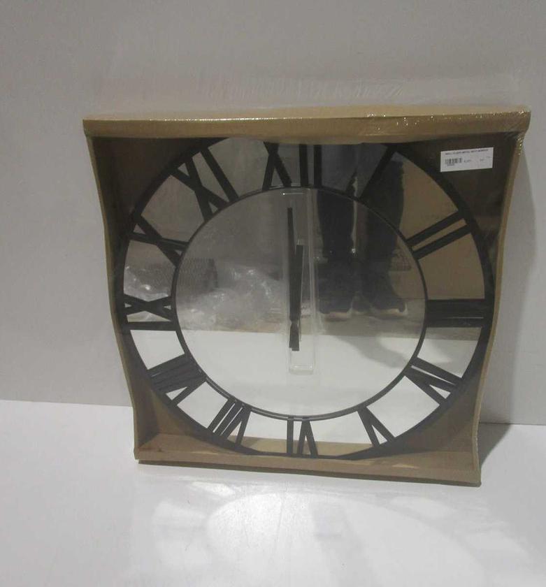 Wall clock metal with mirror image