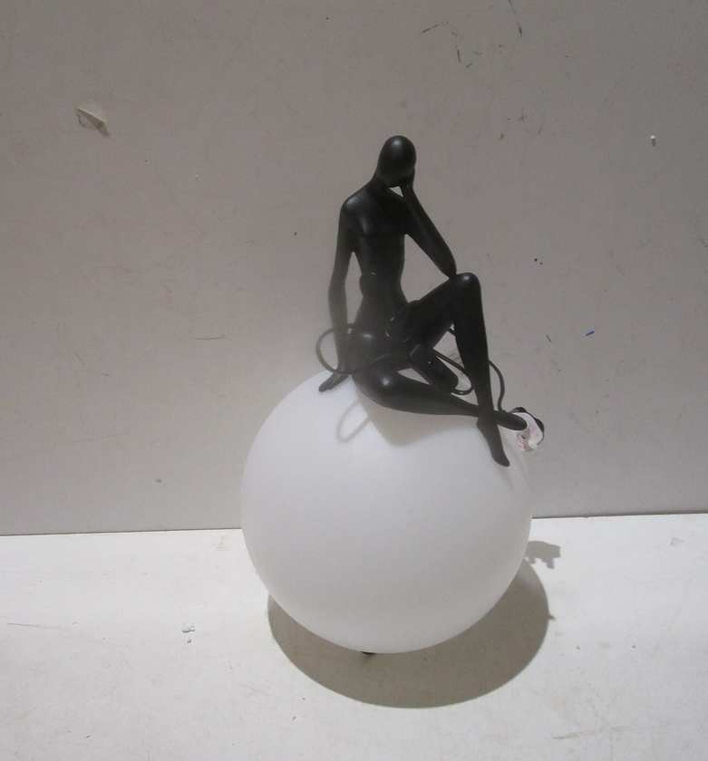 Lamp w man on it image